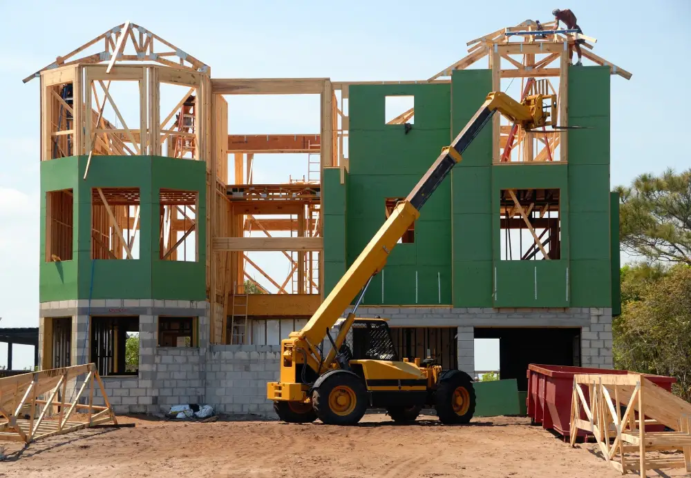 a large crane is attached to a large wooden structure.