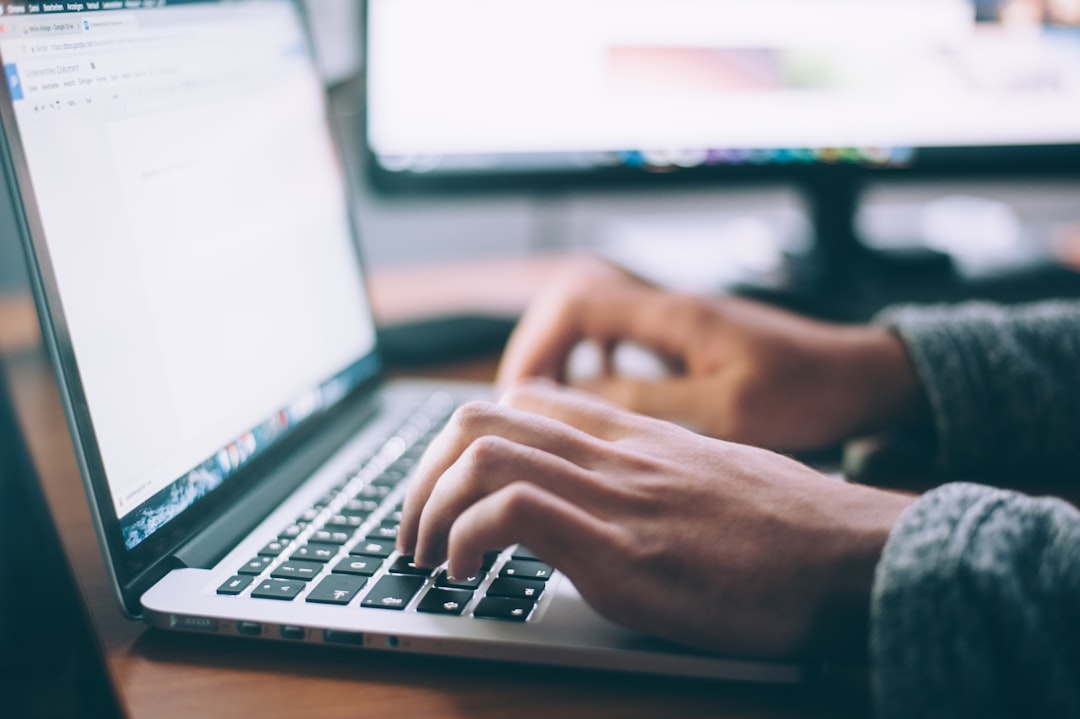 a person using a laptop computer.